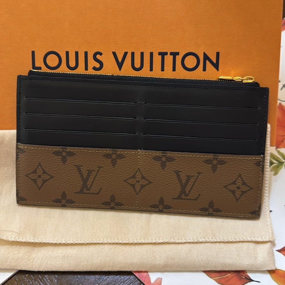 LOUIS VUITTON
Slim Purse Monogram Reverse Canvas Wallet Brown